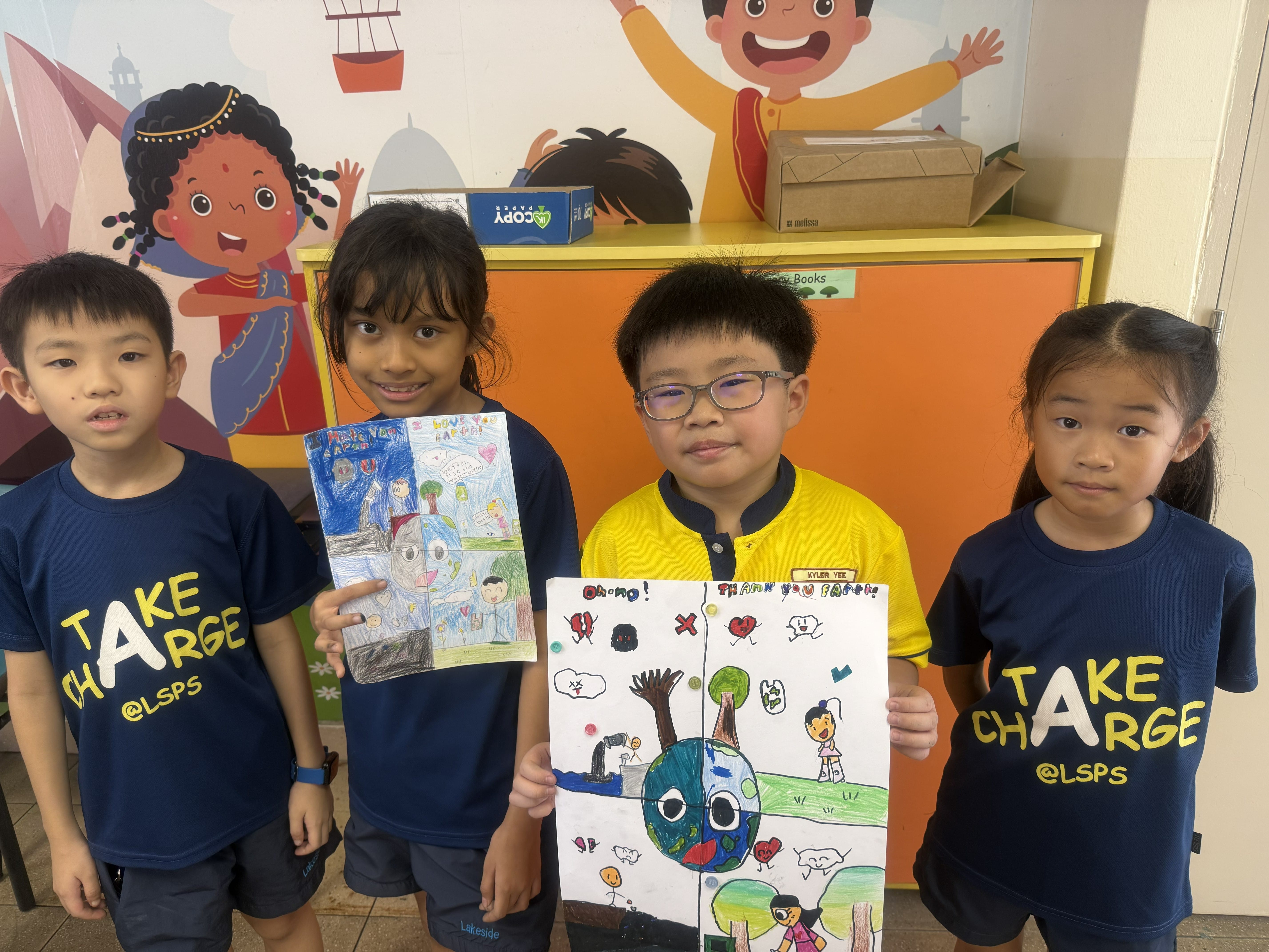 A group photo of 4 students and their finished product to advocate for good waste management habits in school
